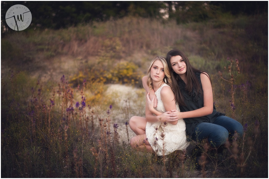 Two teen sisters at sunset on the ranch