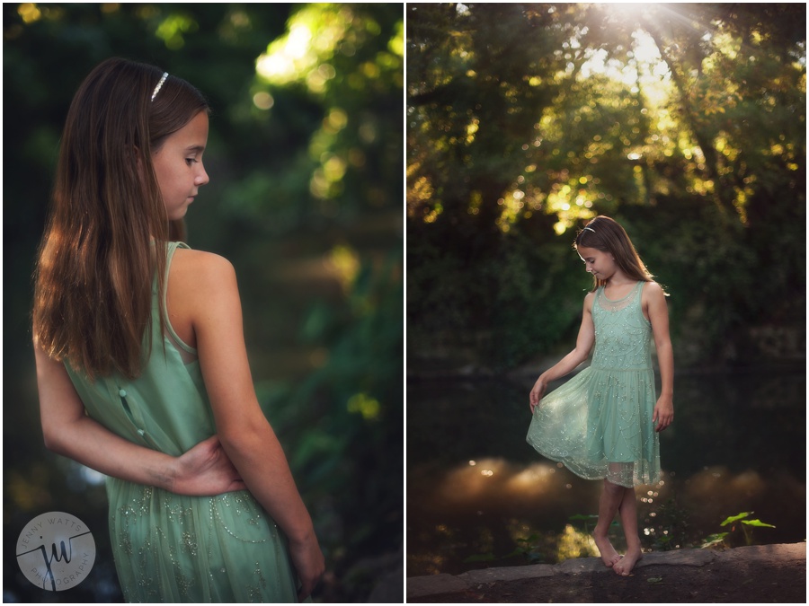 young girl holding pastel green dress in front of the sunset